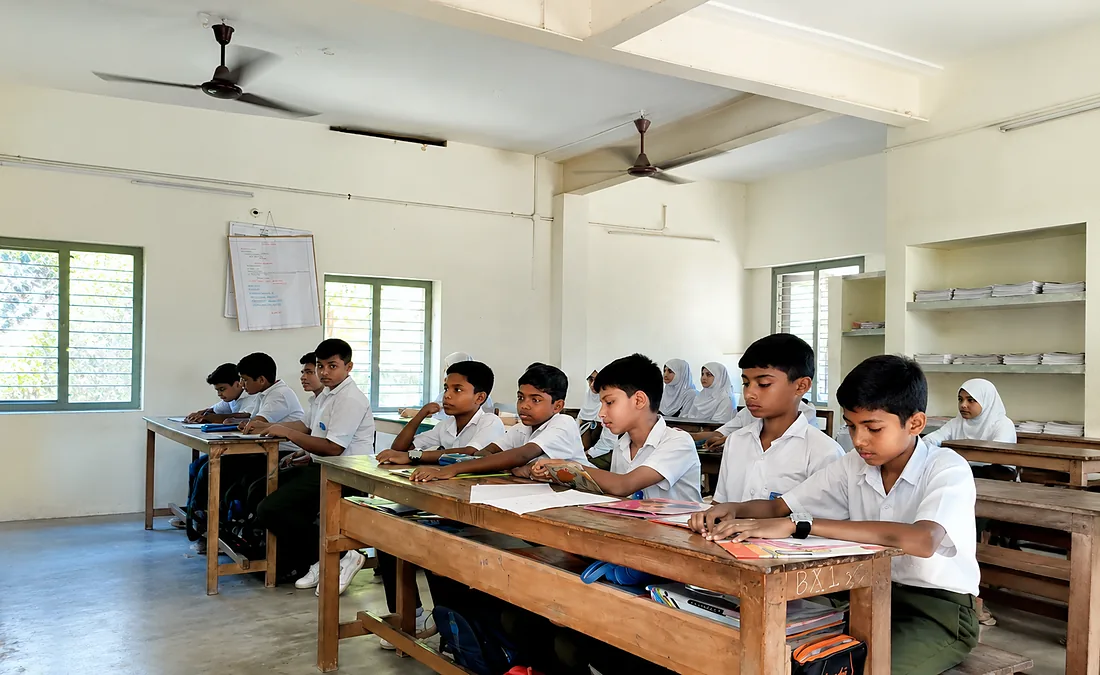 Primary students studying in their classroom